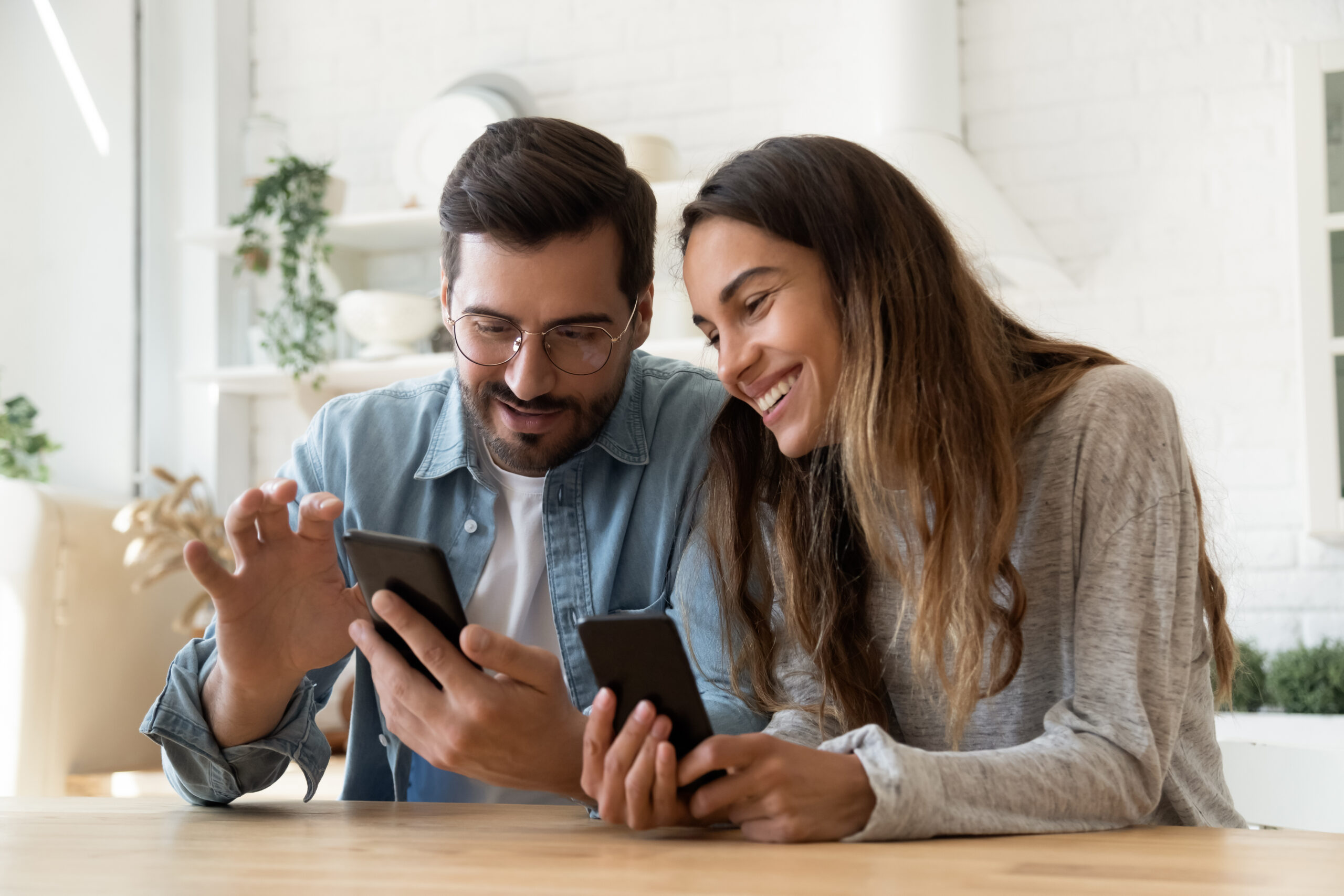 Couple on their phones